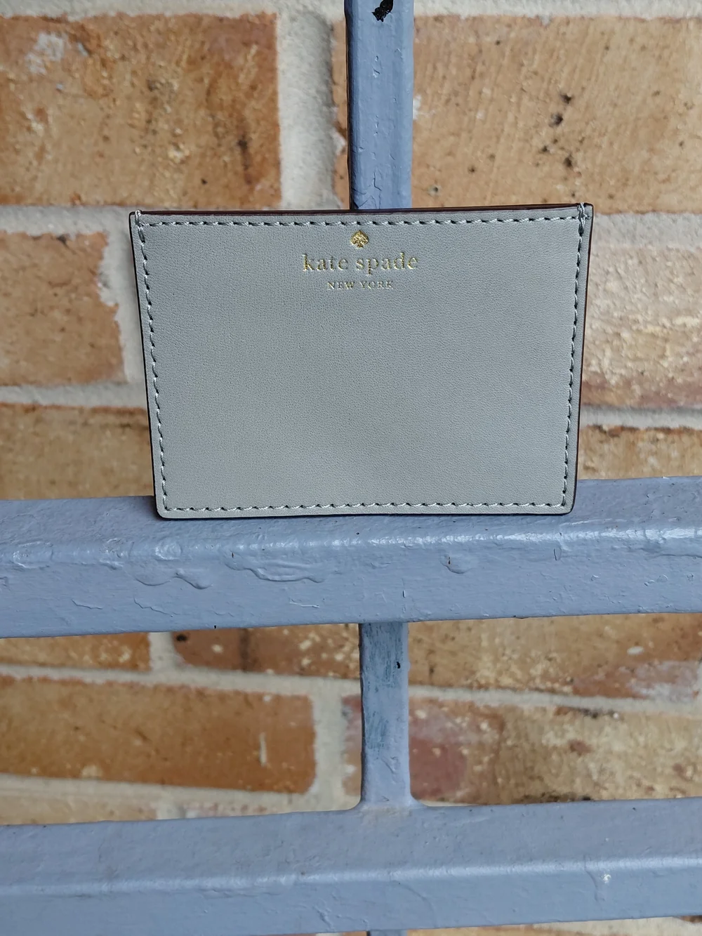 kate spade White and Light Blue Snake-Print Crossbody with Gold Chain